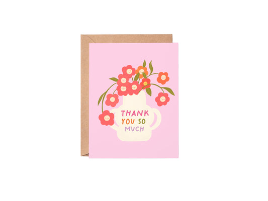 Greeting card with floral design and 'Thank you so much' text on a pink background