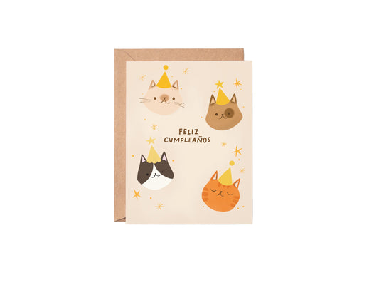 Greeting card with cat illustrations and 'Feliz Cumpleános' text on a white background