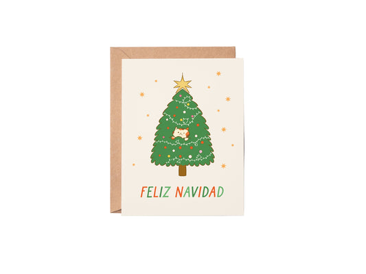Christmas card with a tree and cat illustration and 'Feliz Navidad' text on a white background