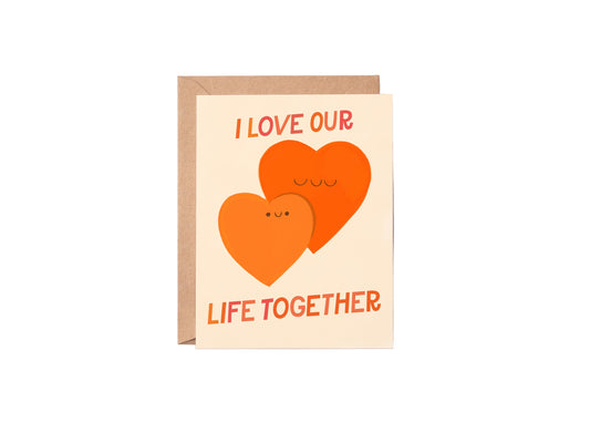 Greeting card with two hearts and text on a white background
