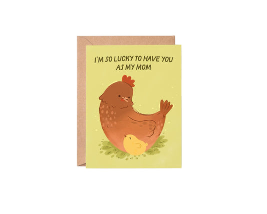 Card with illustration of a mother hen and chick on a yellow background